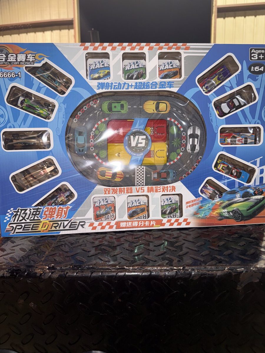 Boxed die-cast race car playsets